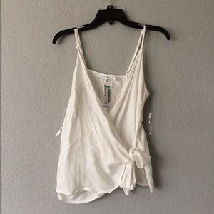 White tie-able tank top on the left side